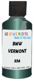 Detail brush applying Green Metallic to a small door scratch on an Bmw 7-Series, clean OEM finish
