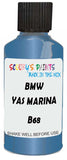 Detail brush applying Blue Metallic to a small door scratch on an Bmw M4 Coupe, clean OEM finish