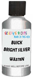 Detail brush applying Silver Metallic to a small door scratch on an Buick Enclave, clean OEM finish
