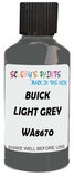 Detail brush applying Grey Solid to a small door scratch on an Buick Century, clean OEM finish