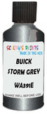 Detail brush applying Grey Metallic to a small door scratch on an Buick Rainier, clean OEM finish