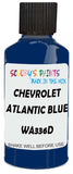 Detail brush applying Blue Solid to a small door scratch on an Chevrolet Cobalt, clean OEM finish