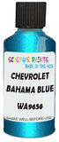 Detail brush applying Blue Metallic to a small door scratch on an Chevrolet Trucks, clean OEM finish