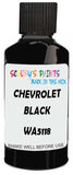 Detail brush applying Black Solid to a small door scratch on an Chevrolet Trucks, clean OEM finish