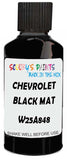 Detail brush applying Black Solid to a small door scratch on an Chevrolet Trucks, clean OEM finish