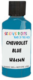Detail brush applying Blue Solid to a small door scratch on an Chevrolet Colorado, clean OEM finish
