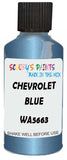 Detail brush applying Blue Metallic to a small door scratch on an Chevrolet Colorado, clean OEM finish