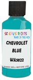 Detail brush applying Blue Solid to a small door scratch on an Chevrolet Tahoe, clean OEM finish