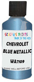 Detail brush applying Blue Metallic to a small door scratch on an Chevrolet Trucks, clean OEM finish