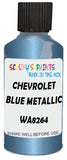 Detail brush applying Blue Metallic to a small door scratch on an Chevrolet Trucks, clean OEM finish