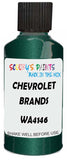 Detail brush applying Green Metallic to a small door scratch on an Chevrolet Corvette, clean OEM finish