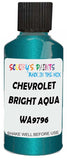 Detail brush applying Blue Metallic to a small door scratch on an Chevrolet Corvette, clean OEM finish