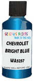 Detail brush applying Blue Metallic to a small door scratch on an Chevrolet Trucks, clean OEM finish