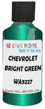 Detail brush applying Green Metallic to a small door scratch on an Chevrolet Trucks, clean OEM finish