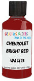 Detail brush applying Red Solid to a small door scratch on an Chevrolet Trucks, clean OEM finish