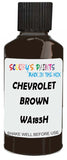 Detail brush applying Brown Solid to a small door scratch on an Chevrolet Blazer, clean OEM finish
