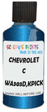 Detail brush applying Blue Metallic to a small door scratch on an Chevrolet C/K Pickup, clean OEM finish