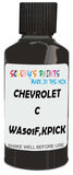 Detail brush applying Grey Solid to a small door scratch on an Chevrolet C/K Pickup, clean OEM finish