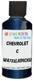 Detail brush applying Blue Metallic to a small door scratch on an Chevrolet C/K Pickup, clean OEM finish