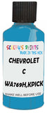 Detail brush applying Blue Solid to a small door scratch on an Chevrolet C/K Pickup, clean OEM finish