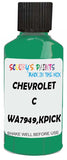 Detail brush applying Green Solid to a small door scratch on an Chevrolet C/K Pickup, clean OEM finish