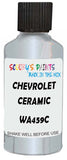 Detail brush applying White Metallic to a small door scratch on an Chevrolet Corvette, clean OEM finish