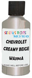 Detail brush applying Beige Metallic to a small door scratch on an Chevrolet Chevy, clean OEM finish
