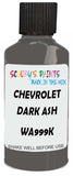 Detail brush applying Grey Solid to a small door scratch on an Chevrolet Tahoe, clean OEM finish
