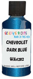 Detail brush applying Blue Metallic to a small door scratch on an Chevrolet Corvette, clean OEM finish