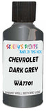 Detail brush applying Grey Metallic to a small door scratch on an Chevrolet Trucks, clean OEM finish