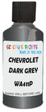 Detail brush applying Grey Metallic to a small door scratch on an Chevrolet Colorado, clean OEM finish