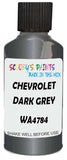Detail brush applying Grey Metallic to a small door scratch on an Chevrolet Corvette, clean OEM finish