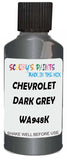 Detail brush applying Grey Metallic to a small door scratch on an Chevrolet Tracker, clean OEM finish