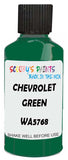 Detail brush applying Green Solid to a small door scratch on an Chevrolet Blazer, clean OEM finish