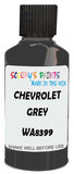 Detail brush applying Grey Solid to a small door scratch on an Chevrolet Blazer, clean OEM finish