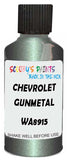 Detail brush applying Grey Metallic to a small door scratch on an Chevrolet Suburban, clean OEM finish