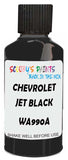 Detail brush applying Black Solid to a small door scratch on an Chevrolet Tracker, clean OEM finish