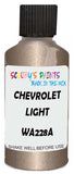 Detail brush applying Brown Metallic to a small door scratch on an Chevrolet Suburban, clean OEM finish