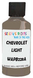 Detail brush applying Brown Solid to a small door scratch on an Chevrolet Trucks, clean OEM finish