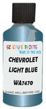 Detail brush applying Blue Metallic to a small door scratch on an Chevrolet Trucks, clean OEM finish