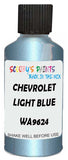 Detail brush applying Blue Metallic to a small door scratch on an Chevrolet Trucks, clean OEM finish