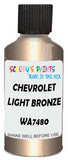 Detail brush applying Gold Metallic to a small door scratch on an Chevrolet Trucks, clean OEM finish