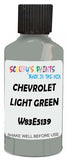 Detail brush applying Green Solid to a small door scratch on an Chevrolet Trucks, clean OEM finish