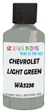 Detail brush applying Green Solid to a small door scratch on an Chevrolet Trucks, clean OEM finish