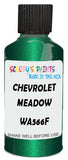 Detail brush applying Green Metallic to a small door scratch on an Chevrolet Blazer, clean OEM finish