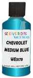 Detail brush applying Blue Metallic to a small door scratch on an Chevrolet Trucks, clean OEM finish