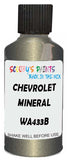 Detail brush applying Beige Metallic to a small door scratch on an Chevrolet Colorado, clean OEM finish