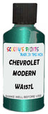 Detail brush applying Green Metallic to a small door scratch on an Chevrolet Aveo, clean OEM finish