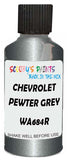 Detail brush applying Grey Metallic to a small door scratch on an Chevrolet Cruze, clean OEM finish