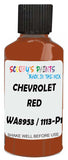Detail brush applying Red Solid to a small door scratch on an Chevrolet Spectrum, clean OEM finish